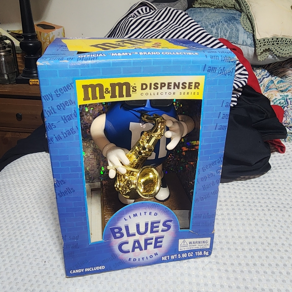 M & M GUC BLUES CAFE LTD CANDY DISPENSER SAXOPHONE PLAYER COLLECTIBLE
